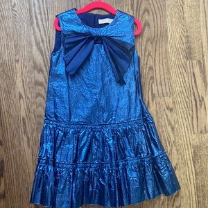 Super adorable party blue metallic looking dresss with big bow
